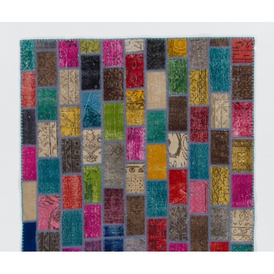 Handmade Turkish Bohemian Patchwork Rug for Modern Interiors. Vintage Wool Carpet in Vivid Colors
