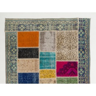 Handmade Patchwork Rug Made from Over-Dyed Vintage Carpets. Contemporary Border Pattern Area Rug in Vivid Colors Handmade Patchwork Rug Made from Over-Dyed Vintage Carpets. Contemporary Border Pattern Area Rug in Vivid Colors