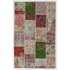 Handmade Patchwork Rug Made from Vintage Turkish Village Carpets