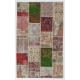 Handmade Patchwork Rug Made from Vintage Turkish Village Carpets