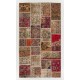 Handmade Patchwork Rug Made from Vintage Turkish Village Carpets