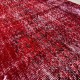 Distressed Vintage Handmade Turkish Rug Over-dyed in Red Color. Woolen Floor Covering Distressed Vintage Handmade Turkish Rug Over-dyed in Red Color. Woolen Floor Covering