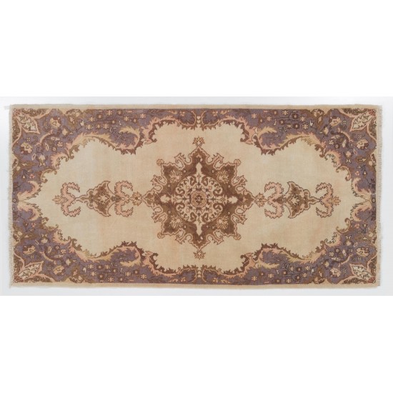 Hand-knotted Vintage Anatolian Oushak Rug in Soft Colors with Medallion Design. Woolen Floor Covering Hand-knotted Vintage Anatolian Oushak Rug in Soft Colors with Medallion Design. Woolen Floor Covering