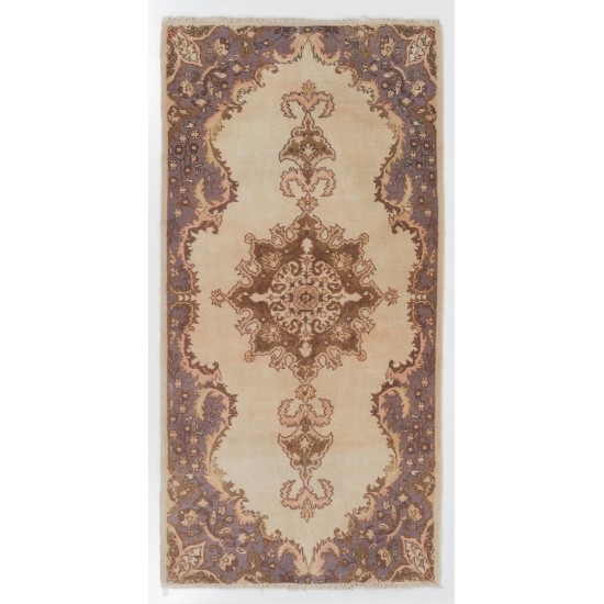 Hand-knotted Vintage Anatolian Oushak Rug in Soft Colors with Medallion Design. Woolen Floor Covering Hand-knotted Vintage Anatolian Oushak Rug in Soft Colors with Medallion Design. Woolen Floor Covering