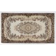 Hand-Knotted Vintage Turkish Area Rug with Medallion Design in Neutral Colors. Woolen Floor Covering