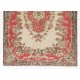 Vintage Hand-Knotted Anatolian Area Rug with Floral Medallion Design