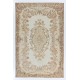 Hand-Knotted Vintage Central Anatolian Area Rug in Soft Colors. Medallion Design Wool Carpet